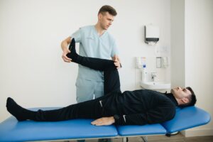 A physiotherapist treating a patient
