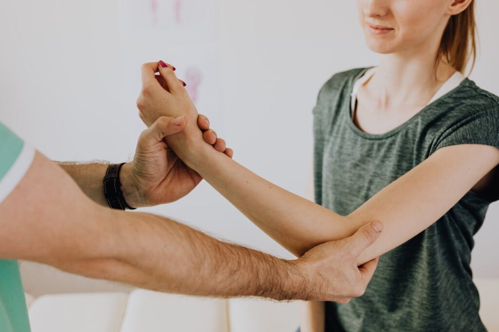 Doctor checking the patient for joint pain
